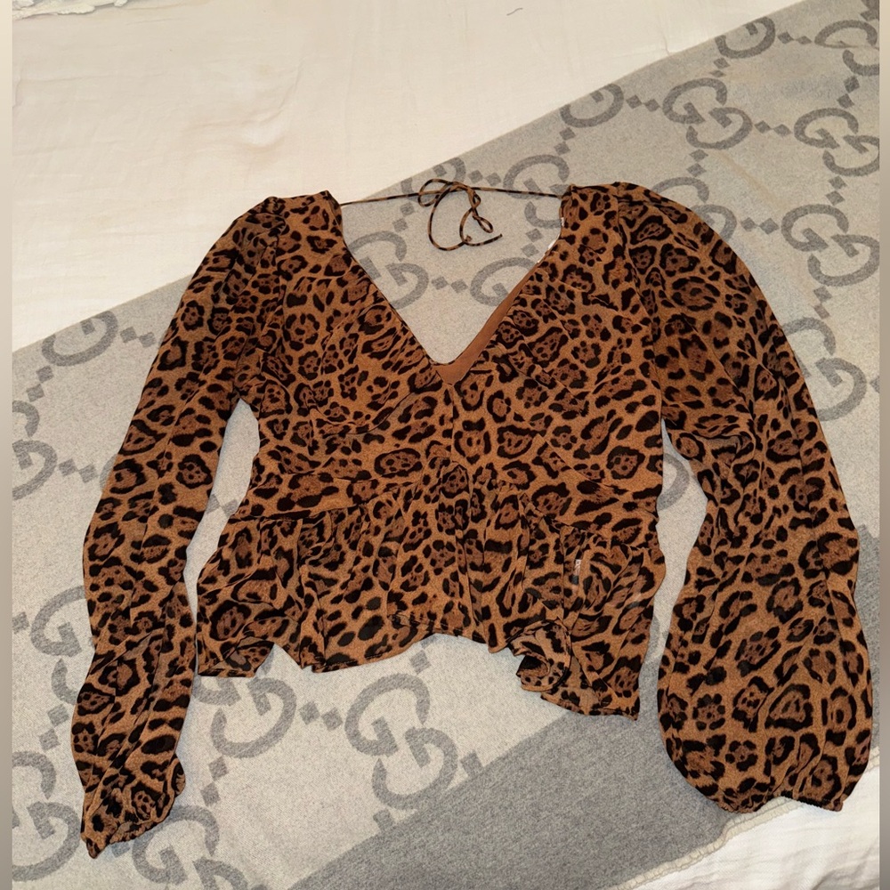 H&M peplum cheetah print crop top long sleeve blouse, size M